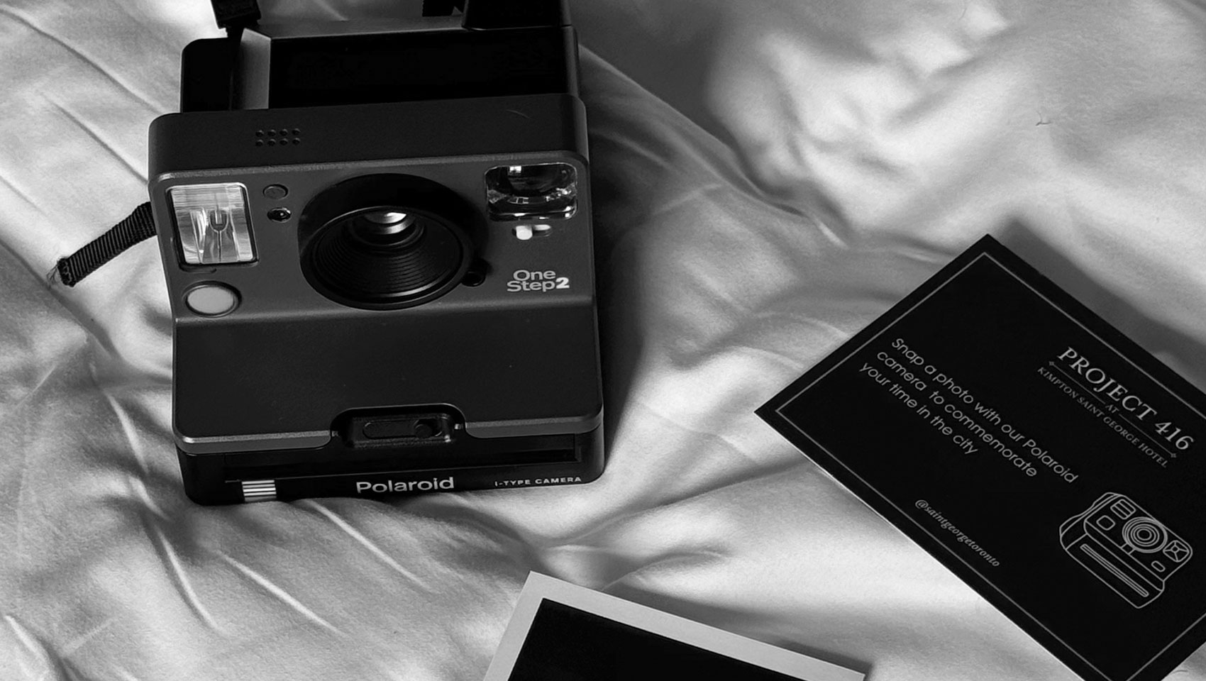 camera and images on bed